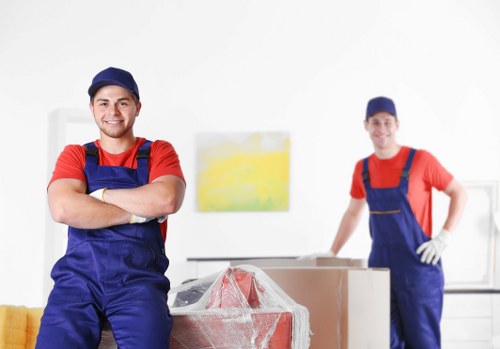 House removalists assisting with moving boxes in Highbury